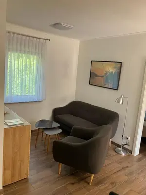 Ein Sitzbereich in der Unterkunft Havelstern Ketzin, Ferienhaus Barsch
