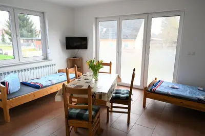 Ein Bett oder Betten in einem Zimmer der Unterkunft Moderne Unterkunft für Monteure nahe Berlin
