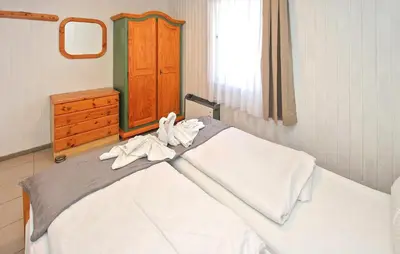 Ein Bett oder Betten in einem Zimmer der Unterkunft Fh Grün