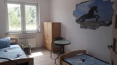 Ein Bett oder Betten in einem Zimmer der Unterkunft Monteure sind HERZLICH WILLKOMMEN!