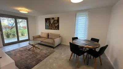 Ein Sitzbereich in der Unterkunft Ruhige Wohnung mit Garten