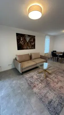 Ein Sitzbereich in der Unterkunft Ruhige Wohnung mit Garten
