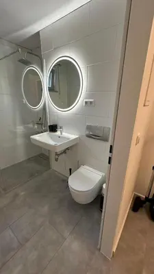 Ein Badezimmer in der Unterkunft Ruhige Wohnung mit Garten