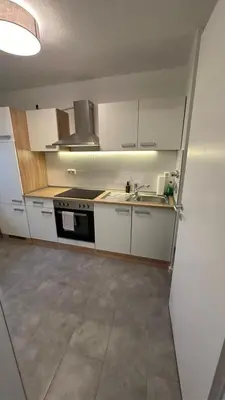 Küche/Küchenzeile in der Unterkunft Sehr Schöne 2-Zimmer Wohnung mit Garten W184