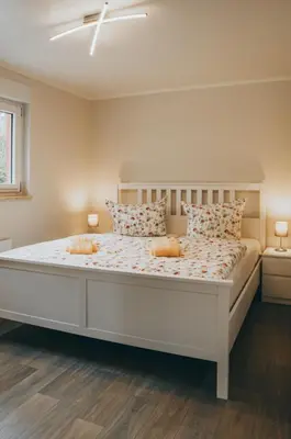 Ein Bett oder Betten in einem Zimmer der Unterkunft Ferienhaus Oberspreewald