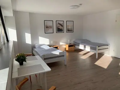 Ein Bett oder Betten in einem Zimmer der Unterkunft Seenland Gästezimmer