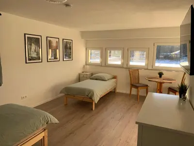 Ein Bett oder Betten in einem Zimmer der Unterkunft Seenland Gästezimmer