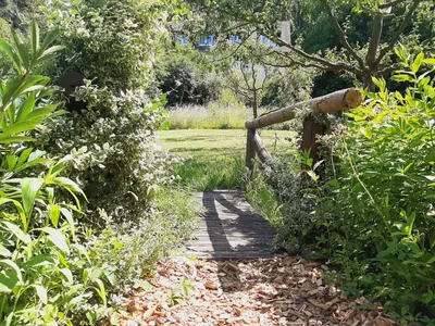Ein Garten an der Unterkunft Die Malche Gäste und Tagungshaus 27
