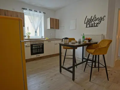 Küche/Küchenzeile in der Unterkunft Hogulu - 2 - RAUM - App 26 mit Balkon in der Nähe der Jahrtausendbrücke