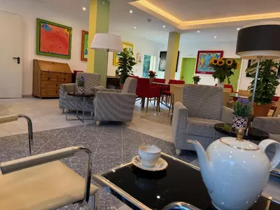 Ein Sitzbereich in der Unterkunft Hotel Dada Art 1-Zimmer Apartment