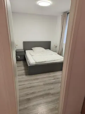 Ein Bett oder Betten in einem Zimmer der Unterkunft NicePlace4You Maxi