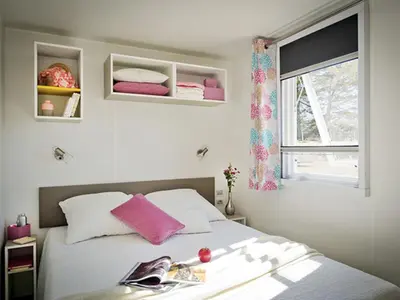 Ein Bett oder Betten in einem Zimmer der Unterkunft Apartment Mobilheim Lagune IV in Lychen by Interhome