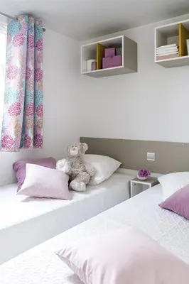 Ein Bett oder Betten in einem Zimmer der Unterkunft Apartment Mobilheim Lagune III Am Strandbad Lychen by Interhome