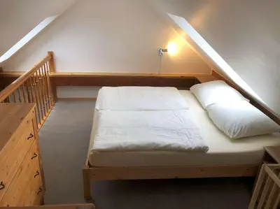 Ein Bett oder Betten in einem Zimmer der Unterkunft Ferienwohnung Wandersruh