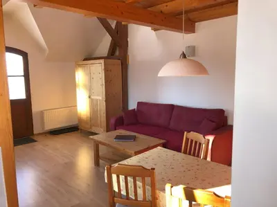Ein Sitzbereich in der Unterkunft Ferienwohnung Wandersruh