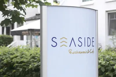 Ein Zertifikat, Auszeichnung, Logo oder anderes Dokument, das in der Unterkunft Ferienwohnung Christiane in der Villa zum Kronprinzen direkt gegenüber der SaarowTherme ausgestellt ist