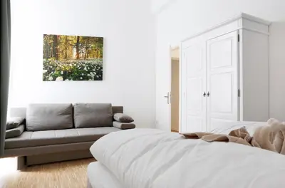Ein Bett oder Betten in einem Zimmer der Unterkunft SC 02 by ROCKCHAIR Apartments l SUPERHOST Status l 4 Bedrooms Boxspringbeds 2 Bathrooms Balcony Elevator - Cozy Family & Business Flair welcomes you!