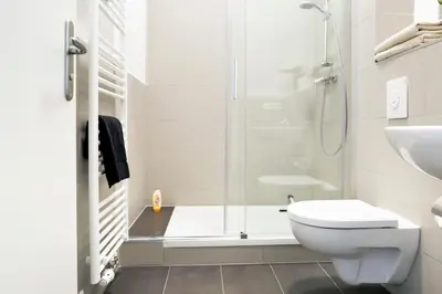 Ein Badezimmer in der Unterkunft SC 01 by ROCKCHAIR Apartments l SUPERHOST Status l 2 Bedrooms Boxspringbeds Balcony Elevator - Cozy Family & Business Flair welcomes you!