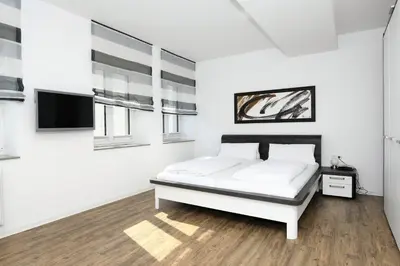 Ein Bett oder Betten in einem Zimmer der Unterkunft Ferienwohnung am Pfaffe-Kai