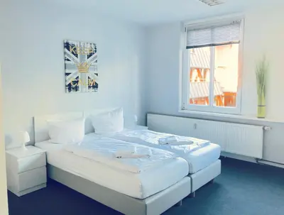 Ein Bett oder Betten in einem Zimmer der Unterkunft BNB Potsdamer Platz Rooms & Apartments