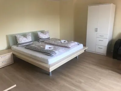 Ein Bett oder Betten in einem Zimmer der Unterkunft Ferienwohnung in der Fahrradpension Joachimsthal