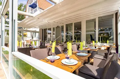 Ein Sitzbereich in der Unterkunft Victoria Suites