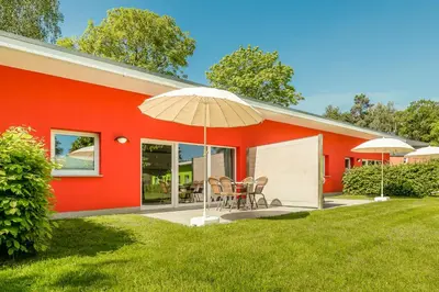 Ein Garten an der Unterkunft Bungis - 28 Ferienhäuser Am Grimnitzsee G4