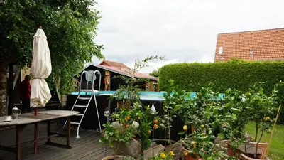 Ein Garten an der Unterkunft Pension Limone Ferienwohnung 2