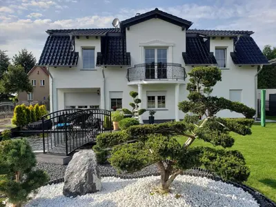 Ein Garten an der Unterkunft SECRA Exclusive Ferienwohnung Schlaubetal Müllrose 1 - Seenähe