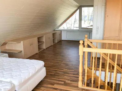 Ein Bett oder Betten in einem Zimmer der Unterkunft Ferienhaus direkt an der Spree mit Whirlpool und Sauna