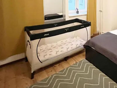 Ein Bett oder Betten in einem Zimmer der Unterkunft Holiday 33 Apartment J Prenzlauerberg