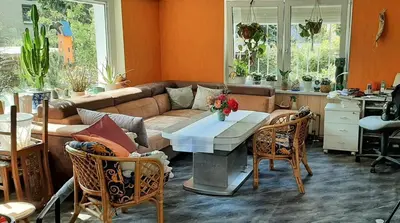 Ein Sitzbereich in der Unterkunft Zimmer für Urlauber, Monteure und Geschäftsreisende